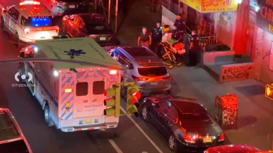 EMS at scene of Lower Manhattan robbery where woman was shot dead